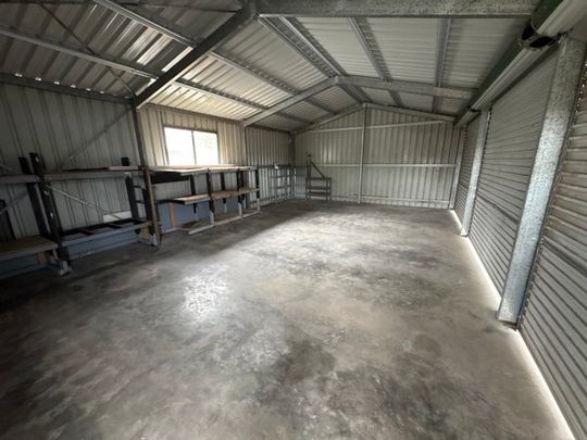 Family home with large backyard and shed - Photo 1