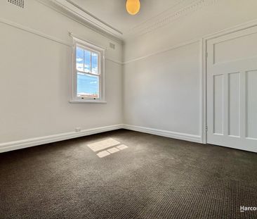 Charming Three Bedroom Home with Sunroom & Large Backyard... - Photo 4