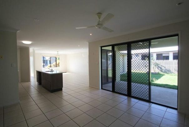 Nestled in Bushland Beach&colon; a 4-Bedroom Modern Comfort Home - Photo 1