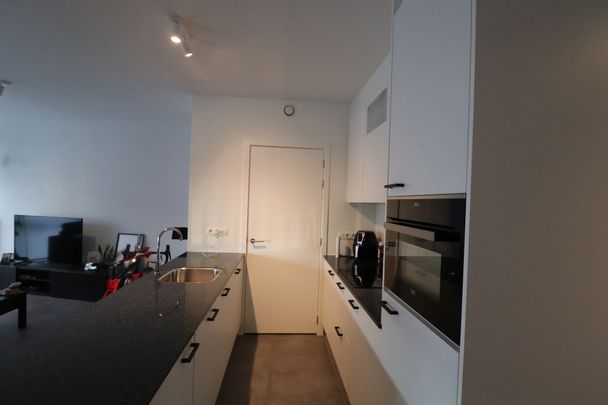 Een mooi afgewerkt nieuwbouw appartement op de eerste verdieping links - met overdekt terras - Foto 1