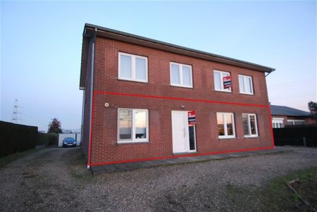 Ruim gelijkvloers appartement met 2 slaapkamers, tuin en garagebox. - Foto 4