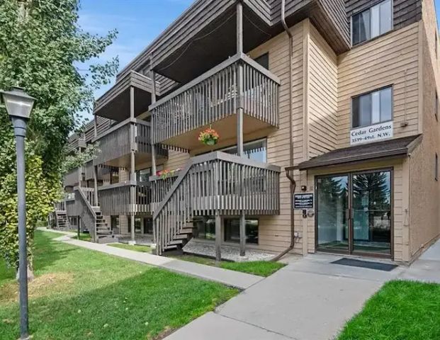 Newly renovated 2 Bedroom and Den | 50 - 3519 49 St NW, Calgary - Photo 1