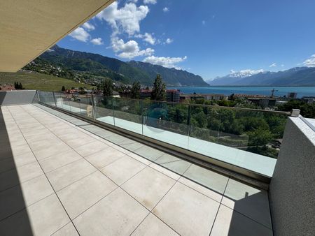 APPARTEMENT DE 2,5 PIÈCES EN ATTIQUE AVEC VUE PANORAMIQUE SUR LE LAC - Photo 4