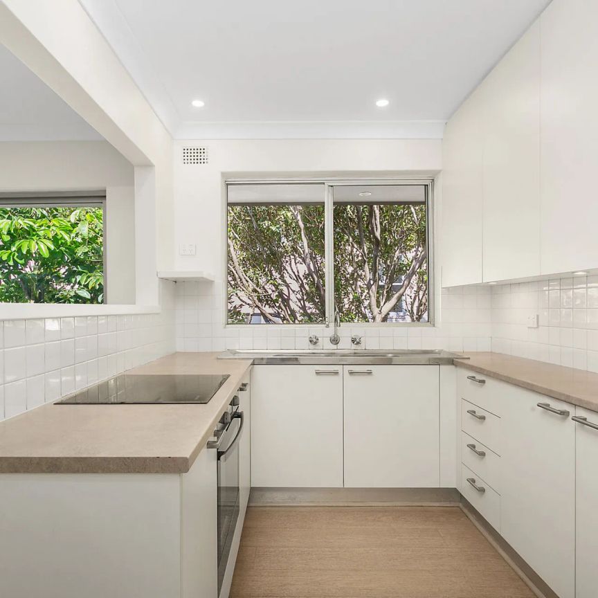 Tranquil Top-Floor Apartment in Premier Seaside Setting - Photo 1