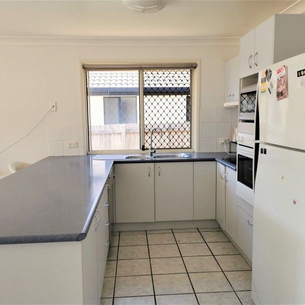 Spacious timber and tile floor. - Photo 1