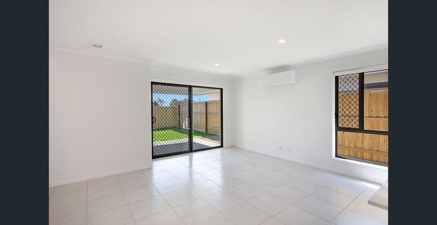 A modern sanctuary in a peaceful, family-friendly pocket, this beautifully finished 4-bedroom home delivers effortless living with a touch of luxury. - Photo 1