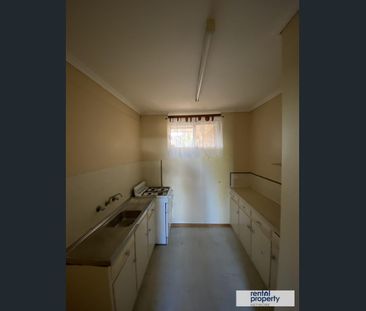 TIDY 2 BEDROOM UPSTAIRS UNIT - Photo 2