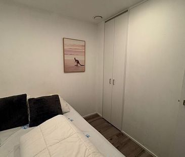 2BR City Retreat | Sea Views & Fully Furnished - Photo 2