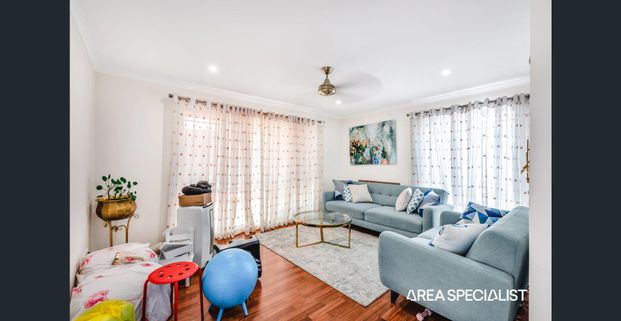 Modern 3-Bedroom Home with Multiple Living Areas & Solar! - Photo 1