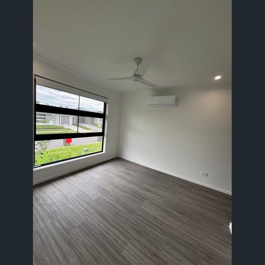 Brand New Luxury Living: 4 Bed, 2 Bath Home in Prime Richlands - Photo 1