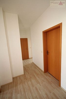 Gemütliche 3-Raum-Dachgeschosswohnung mit zusätzlichem Appartement! - Foto 1