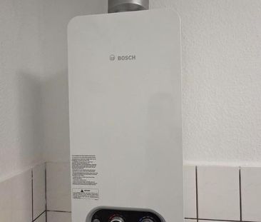 Exklusive 2-Zimmer Wohnung mit EBK in zentraler Lage von Weidenau - Foto 1