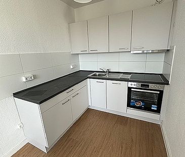 Gemütliche Wohnung mit Einbauküche - Foto 3