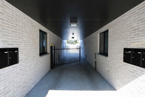 Modern nieuwbouwappartement met garage te Melsele - Foto 1