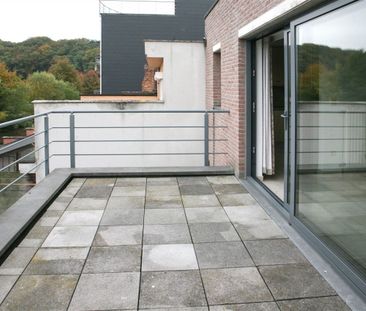 Instapklaar appartement met 2 slpk., autostaanplaats en terras in c... - Photo 1