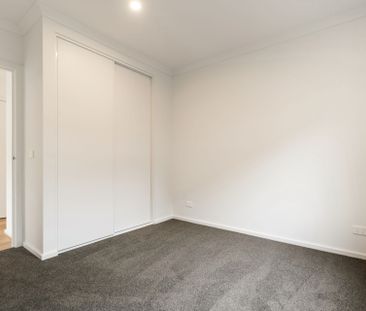 Feel Right at Home in This Charming Four-Bedroom home - Photo 2