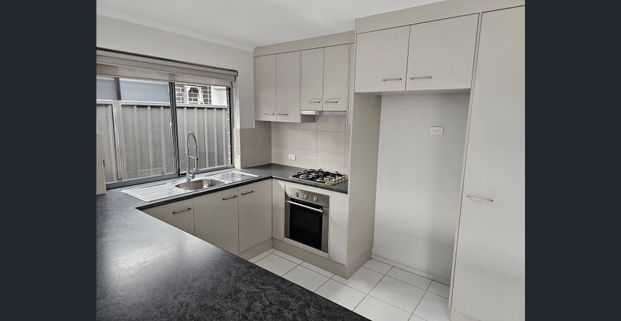 Modern & Convenient Living in Evanston Gardens - Photo 1