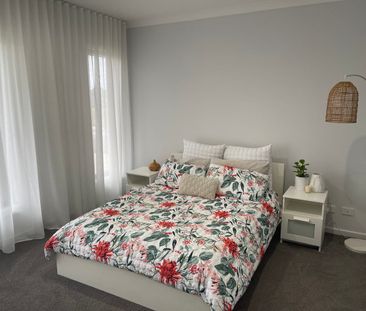 Beautifully designed home not to be missed - Photo 1