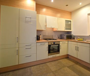 KARAKTERVOLLE WONING MET STADSTUIN - Photo 2