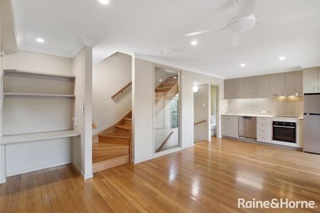 Modern freestanding tri level townhouse with recent upgrades in a boutique complex - Photo 2