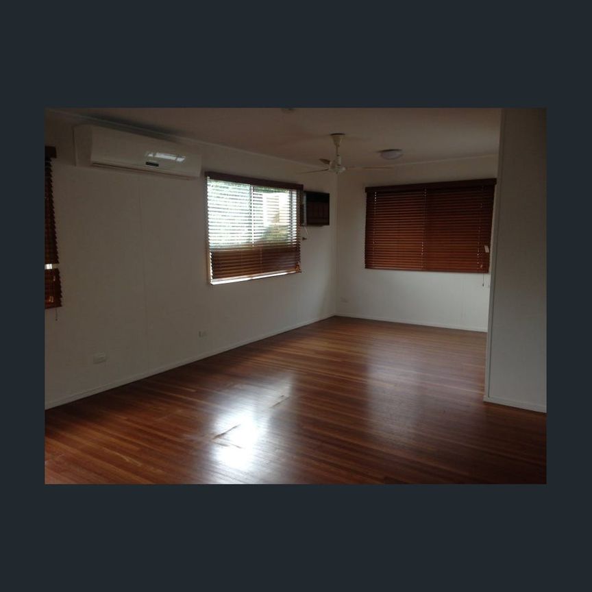 Spacious 4-Bedroom Home with Dual Living & Huge Shed! - Photo 1