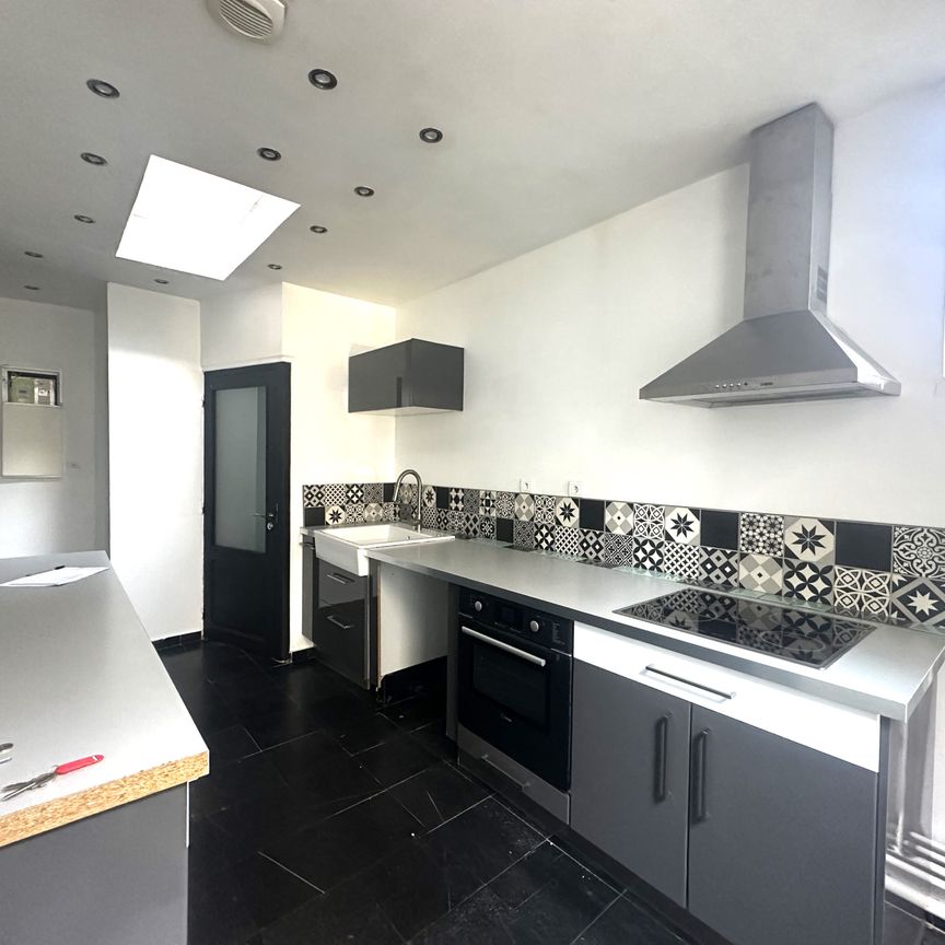 DUPLEX AVEC PATIO EN HYPER CENTRE - Photo 1