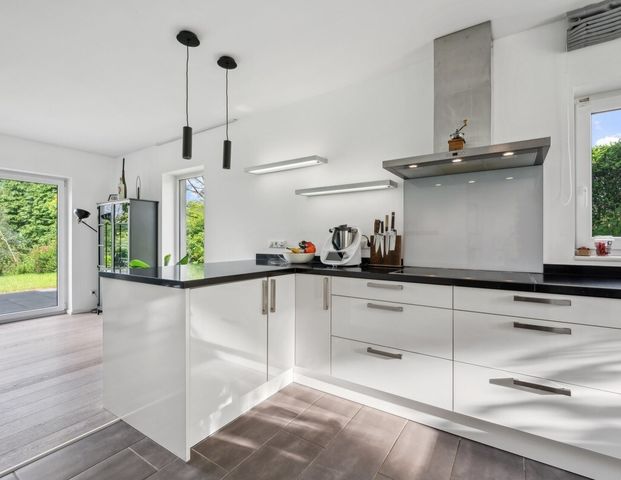 Freistehendes und effizientes Einfamilienhaus in hochwertiger Ausstattung auf großzügigem Grundstück - Foto 1