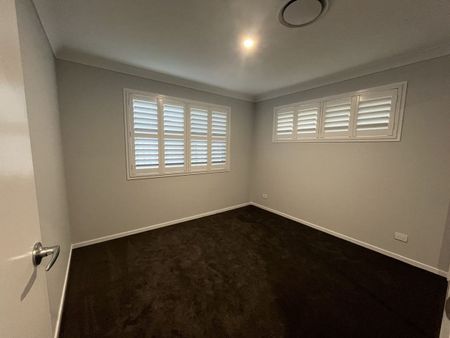 Stylish Modern Home with Ducted A/C & Water Included - Photo 3