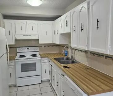 3 Bedroom, 1.5 bath TownHouse with developed rec room in basement |... - Photo 1