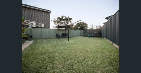 Double Brick Family Home in Peaceful Locale - Photo 5