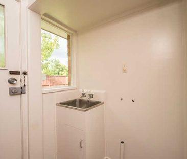 This spacious, tidy, and sunny two-bedroom unit offers comfortable ... - Photo 2