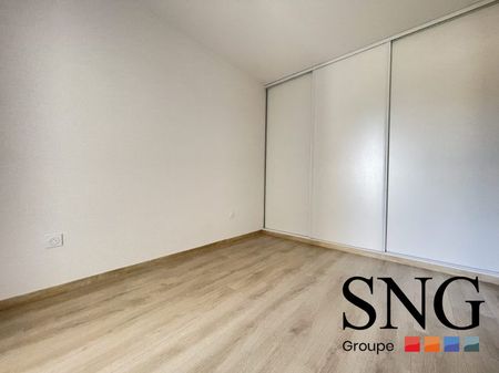 T3 AVEC BALCON ET UN PARKING COUVERT - Photo 5