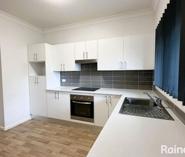 2-Bedroom with Off-Street Parking & Lawn Maintenance Included! - Photo 1