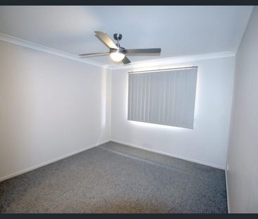 Spacious Family Home with Multiple Living Areas & Modern Comforts - Photo 6