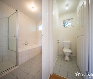 Fantastic Family Home with Additional Living Space in the Garage - Photo 3