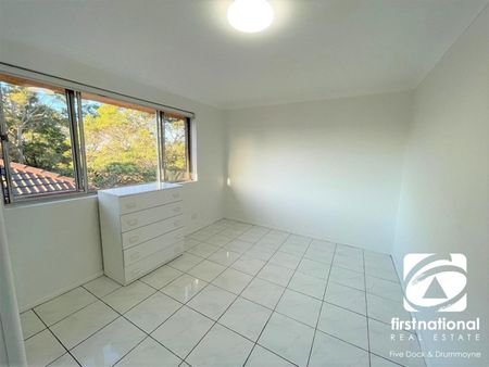 RENOVATED TWO BEDROOM APARTMENT WITH LOCK UP GARAGE - Photo 2