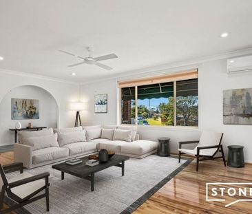 Elevated Three Bedroom Family Home in Sought-After Location! - Photo 1