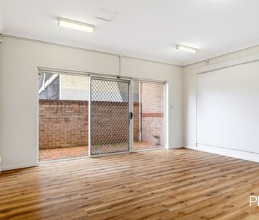 Spacious One-Bedroom Unit with Double Garage and Ample Storage - Photo 1