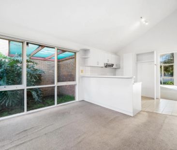 Large two bedroom, two living area townhouse offers rare opportunity - Photo 4