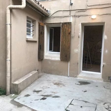 Location Appartement 1 pièce 24m² NIMES 30900 - Photo 3