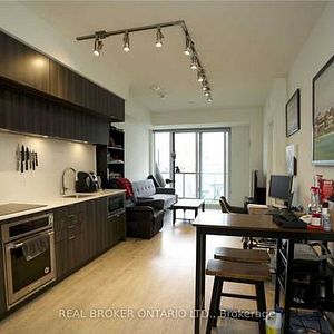 Feels brand new + den high ceilings parking included! - Photo 2