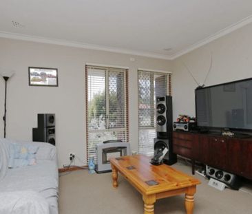 Easily Maintained Property with Spacious Backyard - Photo 6