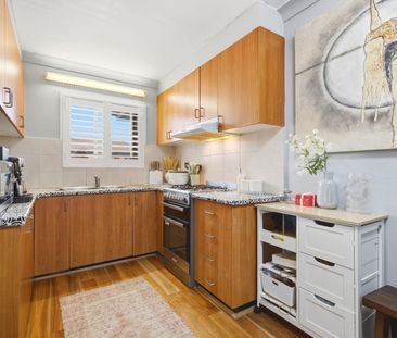 Spacious Top Floor Two-Bedroom Unit with Parking - Photo 4