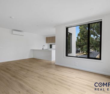 Brand New 4-Bedroom Townhouse! - Photo 1