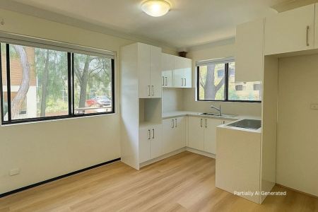 NEWLY RENOVATED - Spacious & Updated 2-Bedroom Unit in the Heart of Carlton - Photo 5