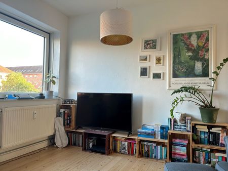 Hyggelig 2-værelses lejlighed i Øgaden med lys og charme - Photo 5