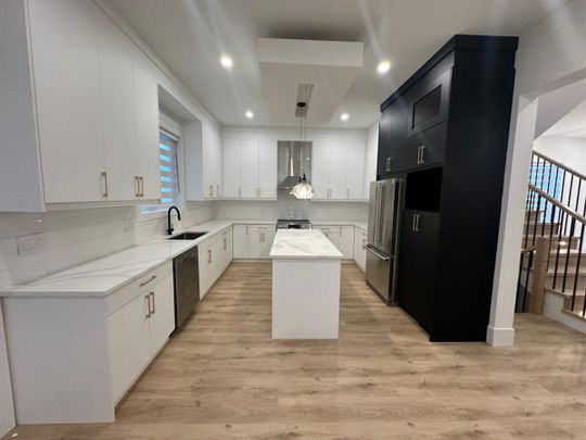 An Upper-Level Unit in a Quiet Neighborhood - Photo 1