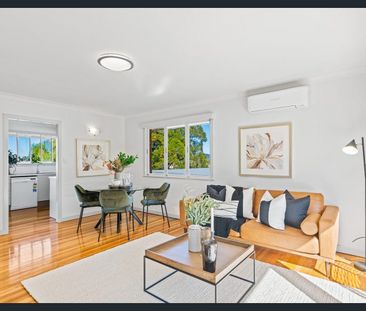 NESTLED WITHIN A QUIET CUL-DE-SAC - Photo 2