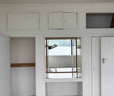 Charming 3BR Home with Courtyard & Deck - Photo 5