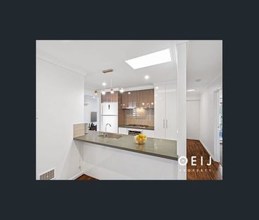 FAMILY OASIS WITH TRIPLE GARAGE & POOL! - Photo 6